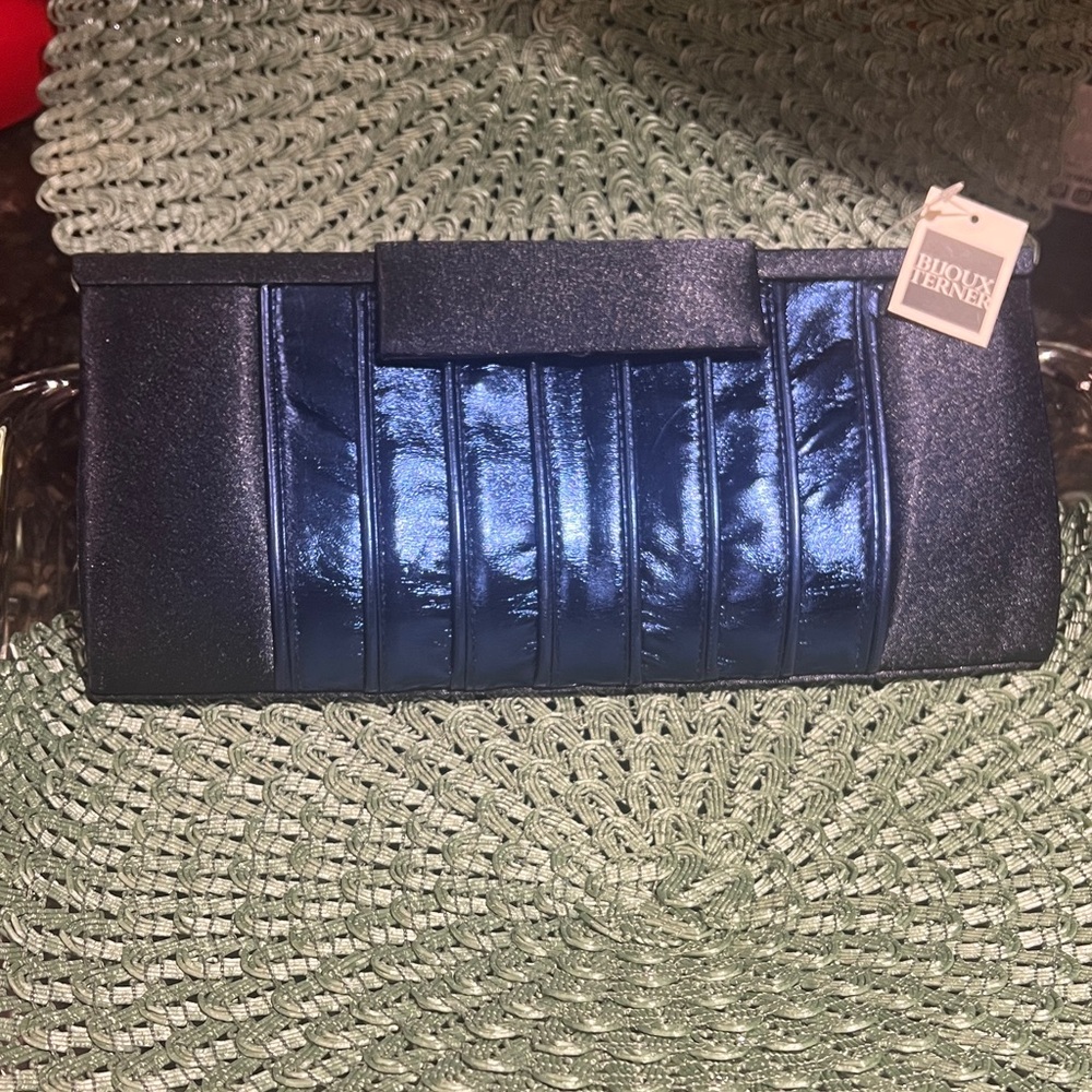 NWT elegant Blue satan evening Clutch. Can be worn with or without silver chain.